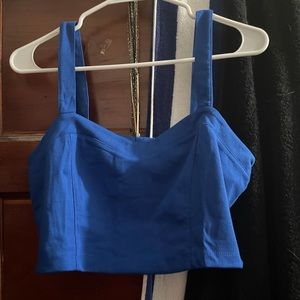Blue crop top with signature bow-back
